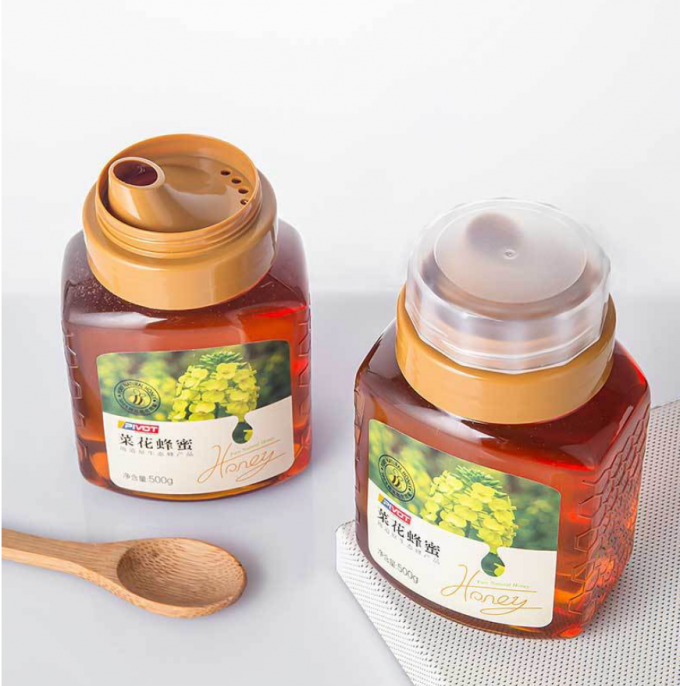 500g 700gの蜂蜜のプラスチック飲料はSqueezable再使用可能なプラスチック瓶をびん詰めにする 0