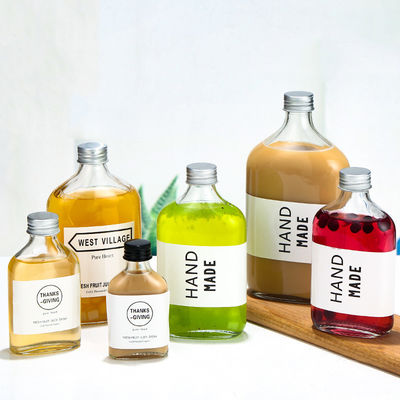 Good price OEMのPBの自由で平らなクリスタル グラスはウォッカの飲料ジュースのための500mlをびん詰めにする オンライン